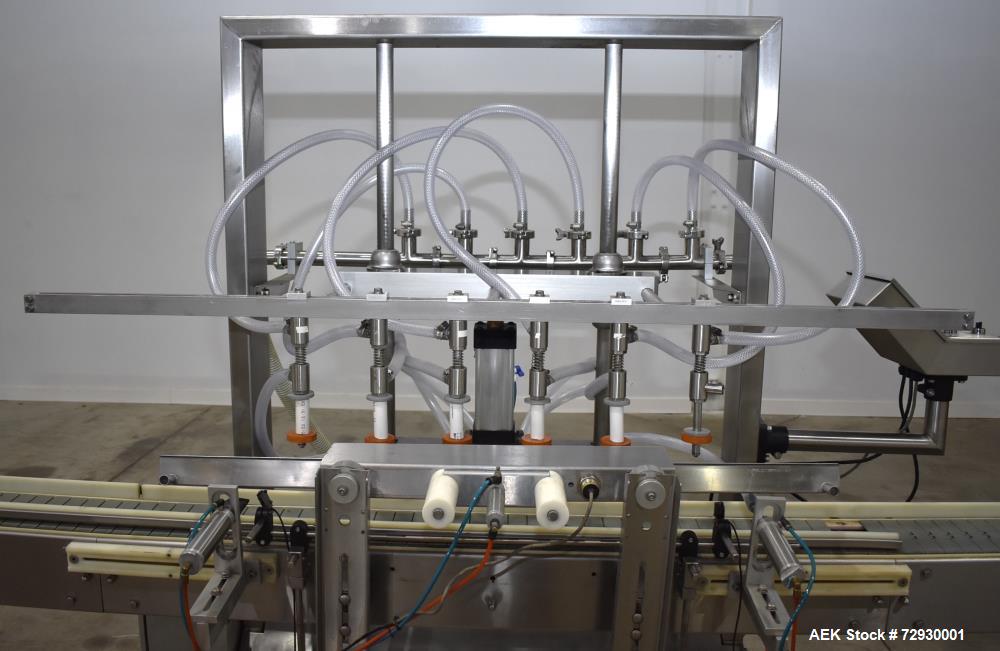 Used Accutek APOF Series Automatic Pressure 6 Head Overflow Filler, Model APOF-6. (6) Stainless steel nozzles, 4.5" x 5/8" diameter. Filling speed of up to 60 CPM. Viscosity range of 2,000 cps (Centi...