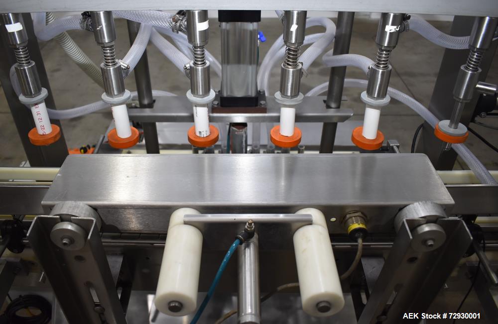 Used Accutek APOF Series Automatic Pressure 6 Head Overflow Filler, Model APOF-6. (6) Stainless steel nozzles, 4.5" x 5/8" diameter. Filling speed of up to 60 CPM. Viscosity range of 2,000 cps (Centi...