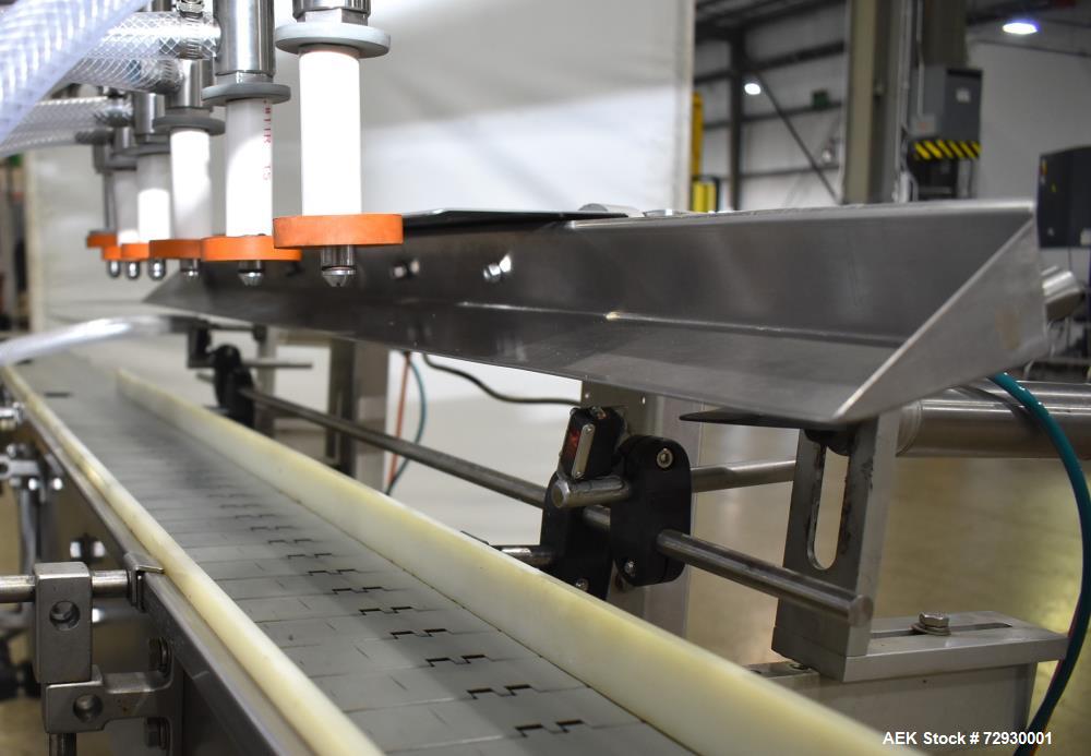 Used Accutek APOF Series Automatic Pressure 6 Head Overflow Filler, Model APOF-6. (6) Stainless steel nozzles, 4.5" x 5/8" diameter. Filling speed of up to 60 CPM. Viscosity range of 2,000 cps (Centi...