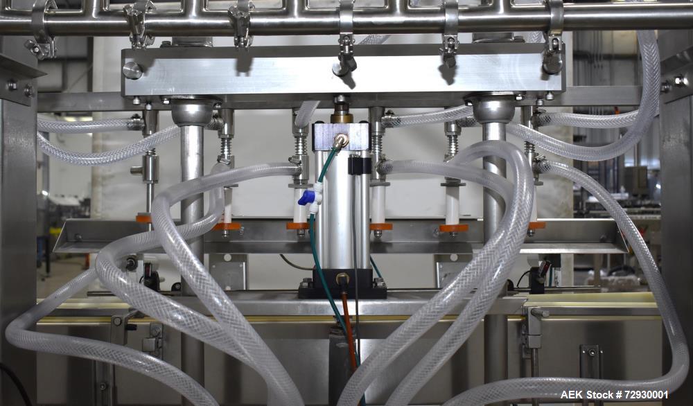 Used Accutek APOF Series Automatic Pressure 6 Head Overflow Filler, Model APOF-6. (6) Stainless steel nozzles, 4.5" x 5/8" diameter. Filling speed of up to 60 CPM. Viscosity range of 2,000 cps (Centi...