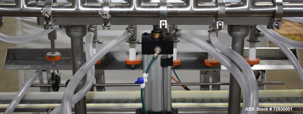 Used Accutek APOF Series Automatic Pressure 6 Head Overflow Filler, Model APOF-6. (6) Stainless steel nozzles, 4.5" x 5/8" diameter. Filling speed of up to 60 CPM. Viscosity range of 2,000 cps (Centi...