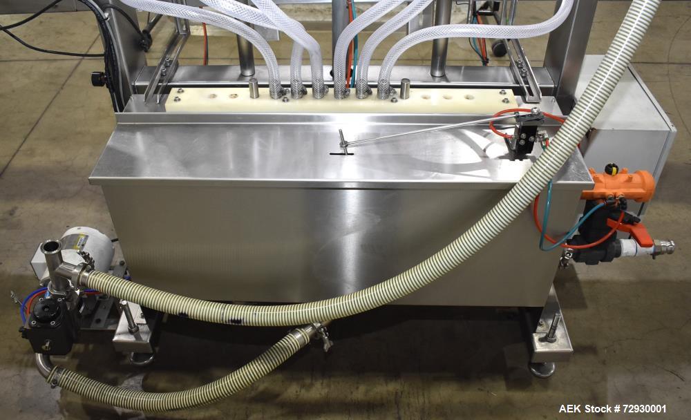 Used Accutek APOF Series Automatic Pressure 6 Head Overflow Filler, Model APOF-6. (6) Stainless steel nozzles, 4.5" x 5/8" diameter. Filling speed of up to 60 CPM. Viscosity range of 2,000 cps (Centi...