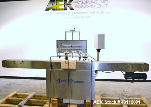 Used Accutek Auto Pinch 25 Automatic 6 Head Timed Flow Volumetric Filling Machine. Capable of speeds up to 60 BPM. Has pneumatic cylinder pin indexing, heavy duty design, 10' long 4-1/2"wide delrin T...