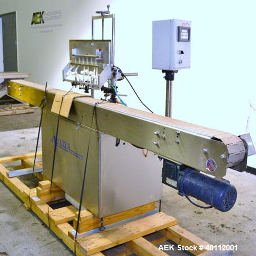 Used Accutek Auto Pinch 25 Automatic 6 Head Timed Flow Volumetric Filling Machine. Capable of speeds up to 60 BPM. Has pneumatic cylinder pin indexing, heavy duty design, 10' long 4-1/2"wide delrin T...