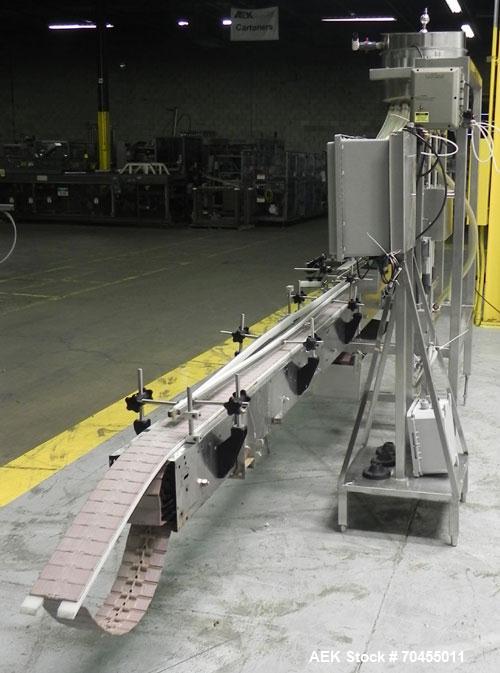 Used ELF (E-PAK) Model 15 CONV 12 Head Inline Time Gravity Pressure Liquid Filler. Capable of speeds over 100 bottles per minute. Has pin indexing system. Neck pneumatic guides. Has a machine mounted...