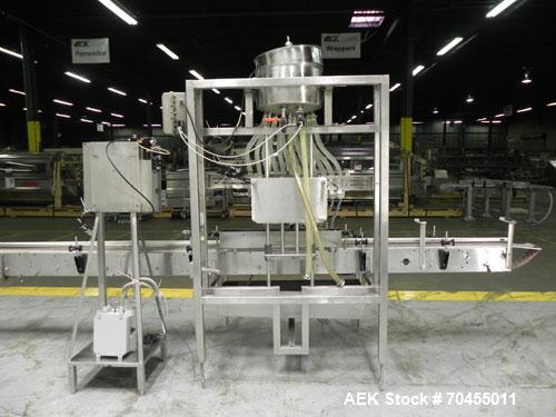 Used ELF (E-PAK) Model 15 CONV 12 Head Inline Time Gravity Pressure Liquid Filler. Capable of speeds over 100 bottles per minute. Has pin indexing system. Neck pneumatic guides. Has a machine mounted...