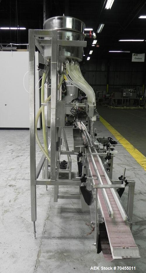 Used ELF (E-PAK) Model 15 CONV 12 Head Inline Time Gravity Pressure Liquid Filler. Capable of speeds over 100 bottles per minute. Has pin indexing system. Neck pneumatic guides. Has a machine mounted...