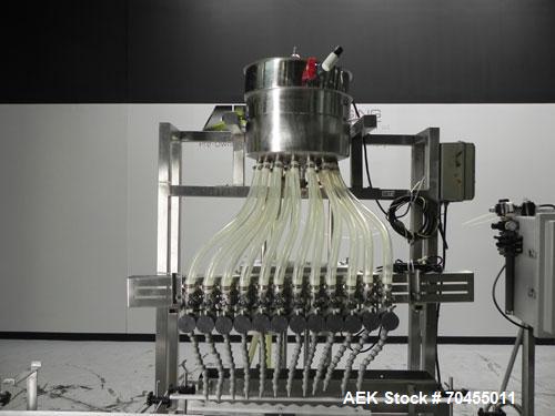 Used ELF (E-PAK) Model 15 CONV 12 Head Inline Time Gravity Pressure Liquid Filler. Capable of speeds over 100 bottles per minute. Has pin indexing system. Neck pneumatic guides. Has a machine mounted...