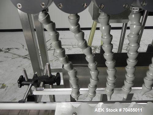 Used ELF (E-PAK) Model 15 CONV 12 Head Inline Time Gravity Pressure Liquid Filler. Capable of speeds over 100 bottles per minute. Has pin indexing system. Neck pneumatic guides. Has a machine mounted...