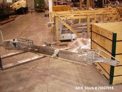 Used Federal 24 Valve Rotary Gallon Gravity Filler. Includes change parts for 64 oz round PET and 1 gallon rectangular PVC bottles. 38mm valves. Includes CIP ring. Right to left bottle flow. Electric...