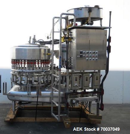 Used Federal 36 Valve Filler and 15 Head Rotary Capper, Model 36/15. 480 VAC, 60 hz, Right to left hand (counter-clockwise) filler rotation. Includes 38mm rotary capper with sorter bowl. All stainles...