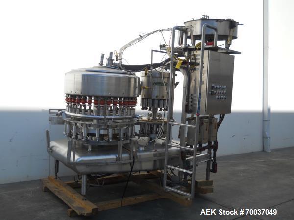 Used Federal 36 Valve Filler and 15 Head Rotary Capper, Model 36/15. 480 VAC, 60 hz, Right to left hand (counter-clockwise) filler rotation. Includes 38mm rotary capper with sorter bowl. All stainles...