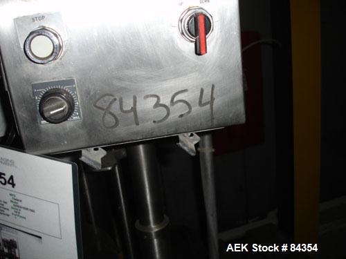 Used Federal Rotary Gravity Filler, Model GWS3/155R1092, 304 Stainless Steel. (15) 1" diameter nozzles on approximate 7-1/2" centers. Set up with a 5 head press-on rotary capper (requires sorter and ...