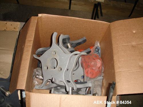 Used Federal Rotary Gravity Filler, Model GWS3/155R1092, 304 Stainless Steel. (15) 1" diameter nozzles on approximate 7-1/2" centers. Set up with a 5 head press-on rotary capper (requires sorter and ...