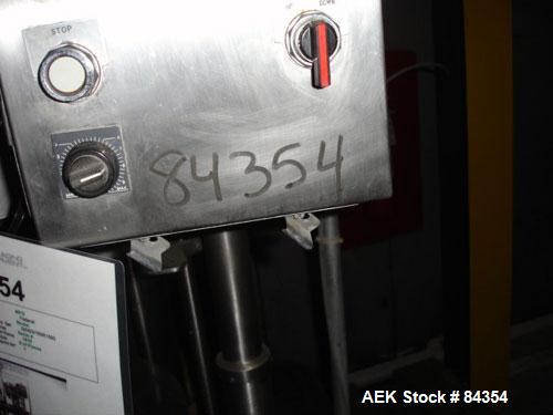 Used Federal Rotary Gravity Filler, Model GWS3/155R1092, 304 Stainless Steel. (15) 1" diameter nozzles on approximate 7-1/2" centers. Set up with a 5 head press-on rotary capper (requires sorter and ...