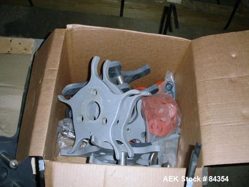 Used Federal Rotary Gravity Filler, Model GWS3/155R1092, 304 Stainless Steel. (15) 1" diameter nozzles on approximate 7-1/2" centers. Set up with a 5 head press-on rotary capper (requires sorter and ...
