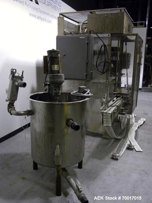Used Filling Equipment Company 24 Head Rotary Overflow Filler, Model 9345122. Unit has 1/2" diameter nozzles on 5-1/4" centers. Contact parts 316 stainless steel. Frame is 304 stainless steel. Right ...