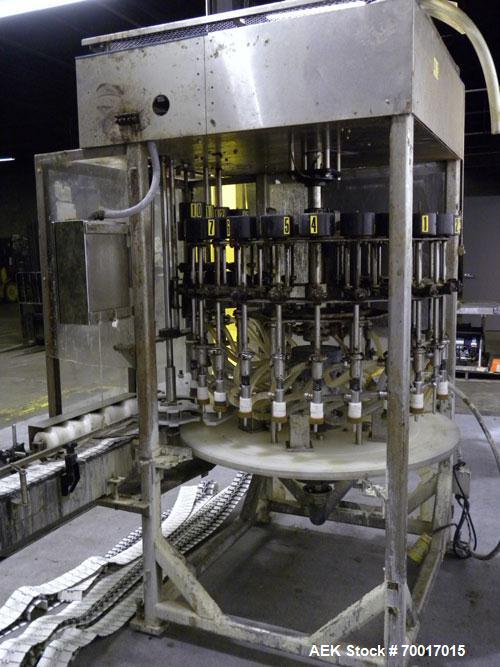 Used Filling Equipment Company 24 Head Rotary Overflow Filler, Model 9345122. Unit has 1/2" diameter nozzles on 5-1/4" centers. Contact parts 316 stainless steel. Frame is 304 stainless steel. Right ...