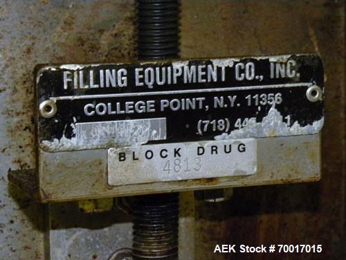 Used Filling Equipment Company 24 Head Rotary Overflow Filler, Model 9345122. Unit has 1/2" diameter nozzles on 5-1/4" centers. Contact parts 316 stainless steel. Frame is 304 stainless steel. Right ...