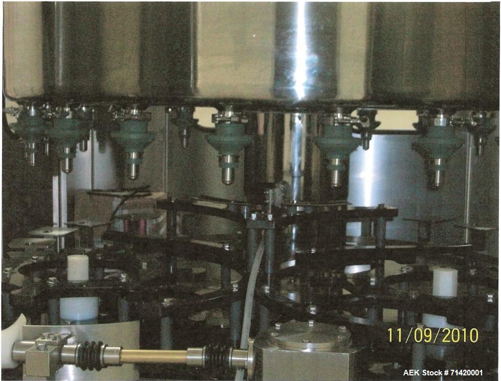 Used Filler Specialties GWFS-21 Head Rotary Filler. Gravity fill-to- level with overhead fille bowl, with  EMV External Mount FastFill Valve and FSI liquid level control.   Last running edible oil in...