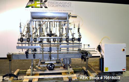 Used Fluid Packaging Solutions 12 Head Inline Automatic Time / Gravity Liquid Filler. Fabricated with 4-1/2" wide x 180" long table top chain conveyor, 5/8" nozzles with positive shut-off valves, div...