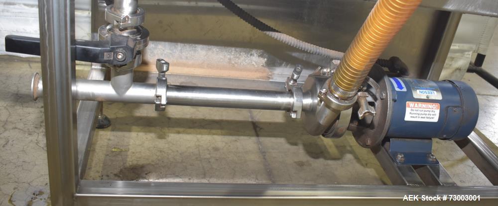 IME Model 2101 8-Head Semi Automatic Inline Pressure Filler.