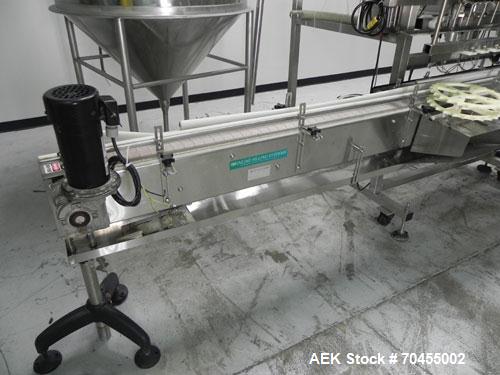 Used Inline Filling Systems 12 head inline time gravity filler. Capable of speeds over 100 bottle per minute. Has star wheel indexing system, neck guides, drip tray, and 12 'long x 4-1/2" wide convey...
