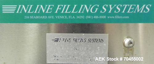 Used Inline Filling Systems 12 head inline time gravity filler. Capable of speeds over 100 bottle per minute. Has star wheel indexing system, neck guides, drip tray, and 12 'long x 4-1/2" wide convey...