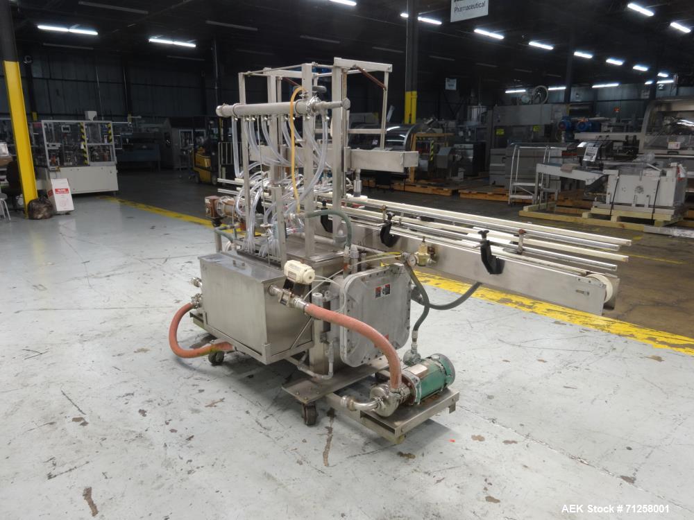 Used MRM Model GRC-A Straight Line Pressure Overflow Liquid Filler