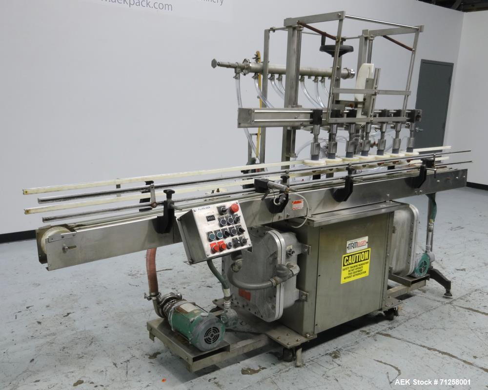 Used MRM Model GRC-A Straight Line Pressure Overflow Liquid Filler