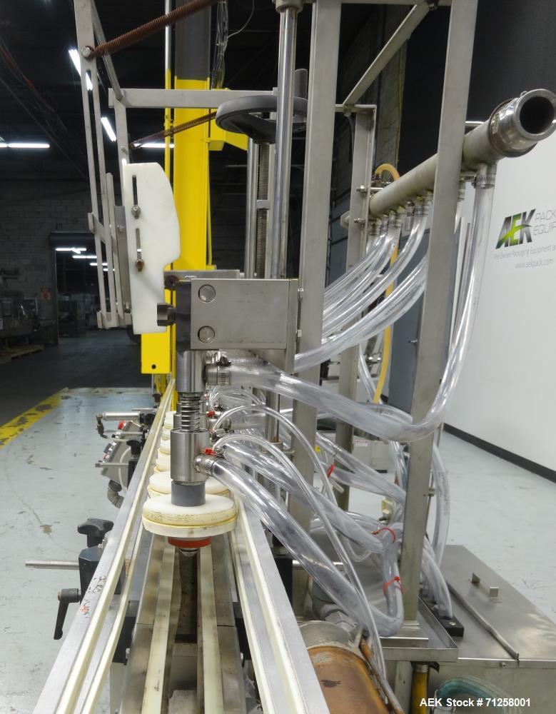 Used MRM Model GRC-A Straight Line Pressure Overflow Liquid Filler