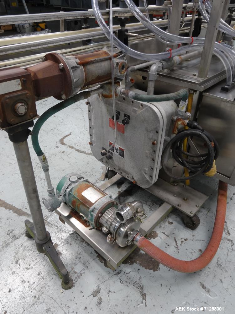 Used MRM Model GRC-A Straight Line Pressure Overflow Liquid Filler