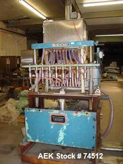 USED: New Way gravity liquid filler, 9 head straight line. Nozzles:(9) 5/8" diameter x 3" long. Stainless steel recirculation tank3' long x 12" wide x 16" deep.