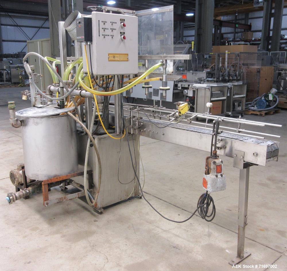 Used- Packaging Dynamics Model SLA-10 Inline Pressure Overflow Liquid Filler