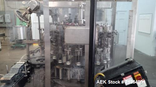 Used Pneumatic Scale Pneumaflow-2 Filler, 20 Heads, previously used to fill 4 ounce bottles.