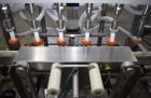 Used Accutek APOF Series Automatic Pressure 6 Head Overflow Filler, Model APOF-6. (6) Stainless steel nozzles, 4.5