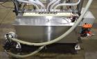 Used Accutek APOF Series Automatic Pressure 6 Head Overflow Filler, Model APOF-6. (6) Stainless steel nozzles, 4.5