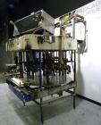 Used Biner-Ellison 18 Head Rotary Gravity/Pressure Filler, Model F-52-TDP-18. Has 1/2