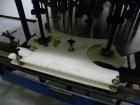 Used Biner-Ellison 18 Head Rotary Gravity/Pressure Filler, Model F-52-TDP-18. Has 1/2