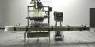 Used ELF (E-PAK) Model 15 CONV 12 Head Inline Time Gravity Pressure Liquid Filler. Capable of speeds over 100 bottles per minute. Has pin indexing system. Neck pneumatic guides. Has a machine mounted...