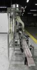 Used ELF (E-PAK) Model 15 CONV 12 Head Inline Time Gravity Pressure Liquid Filler. Capable of speeds over 100 bottles per minute. Has pin indexing system. Neck pneumatic guides. Has a machine mounted...