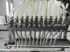 Used ELF (E-PAK) Model 15 CONV 12 Head Inline Time Gravity Pressure Liquid Filler. Capable of speeds over 100 bottles per minute. Has pin indexing system. Neck pneumatic guides. Has a machine mounted...