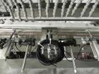 Used ELF (E-PAK) Model 15 CONV 12 Head Inline Time Gravity Pressure Liquid Filler. Capable of speeds over 100 bottles per minute. Has pin indexing system. Neck pneumatic guides. Has a machine mounted...