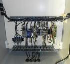 Used ELF (E-PAK) Model 15 CONV 12 Head Inline Time Gravity Pressure Liquid Filler. Capable of speeds over 100 bottles per minute. Has pin indexing system. Neck pneumatic guides. Has a machine mounted...