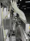 Used ELF (E-PAK) Model 15 CONV 12 Head Inline Time Gravity Pressure Liquid Filler. Capable of speeds over 100 bottles per minute. Has pin indexing system. Neck pneumatic guides. Has a machine mounted...