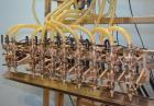 Used ELF Model TG8 10-Head Inline Pressure Gravity Filler