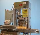 Used Elgin MRM Model R50 Husky 1, 12 Head Filler.
