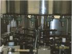 Used Filler Specialties GWFS-21 Head Rotary Filler. Gravity fill-to- level with overhead fille bowl, with  EMV External Mount FastFill Valve and FSI liquid level control.   Last running edible oil in...