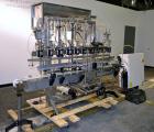 Used Fluid Packaging Solutions 12 Head Inline Automatic Time / Gravity Liquid Filler. Fabricated with 4-1/2
