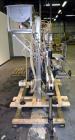 Used Fluid Packaging Solutions 12 Head Inline Automatic Time / Gravity Liquid Filler. Fabricated with 4-1/2